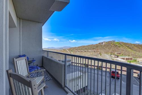 a balcony with two chairs and a view of a mountain at 2 Mi to Ski Resort! Sugar Mtn Condo with Indoor Pool in Sugar Mountain