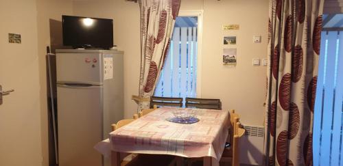 Μια τηλεόραση ή/και κέντρο ψυχαγωγίας στο Mobile-home 2 chambres