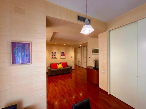 a living room with a couch and a table at Dadu 150 in Bari