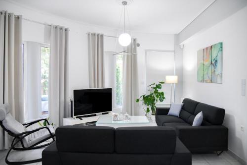 TV a/nebo společenská místnost v ubytování Angel Paradise Villa