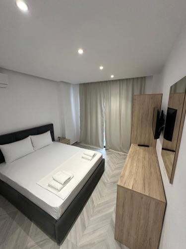 Postel nebo postele na pokoji v ubytování Noa Boutique Hotel