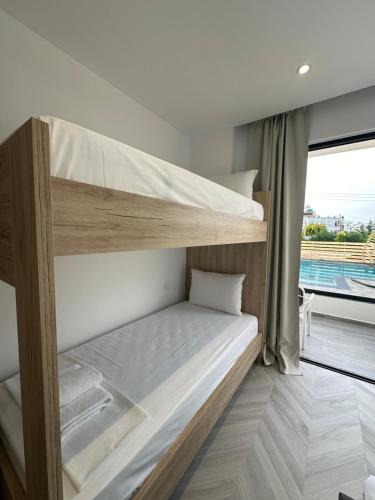 Postel nebo postele na pokoji v ubytování Noa Boutique Hotel