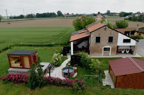 an aerial view of a house and a farm at Adria bnb in Adria