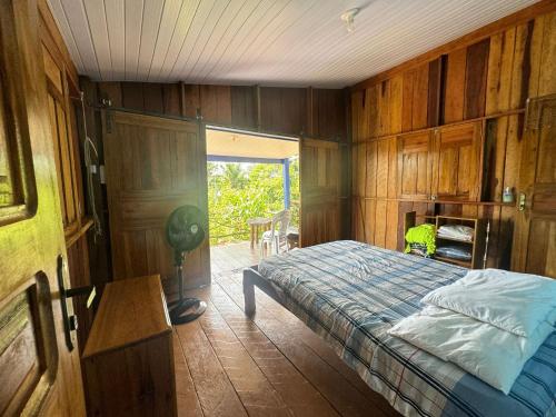 Postel nebo postele na pokoji v ubytování Novo Airão - Espaço Pallafita