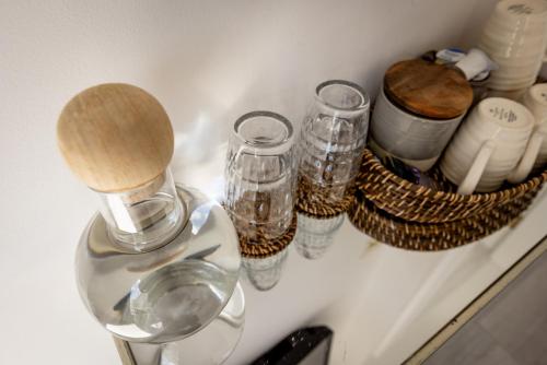a group of glasses sitting on a counter top at Coastal View House in Doolin