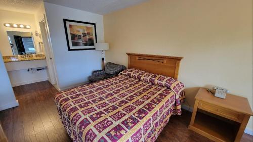 מיטה או מיטות בחדר ב-Nites Inn Motel
