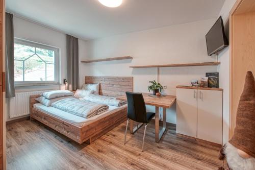 Postel nebo postele na pokoji v ubytování Baienhof