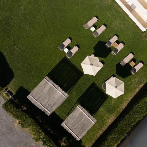 an overhead view of a lawn with chairs and tables at Apollo Plakias in Plakias