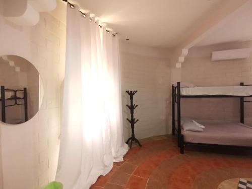 Postel nebo postele na pokoji v ubytování Mitico El Castillo