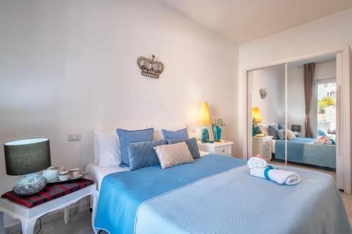 Una cama o camas en una habitación de Casa mare & spa Alghero