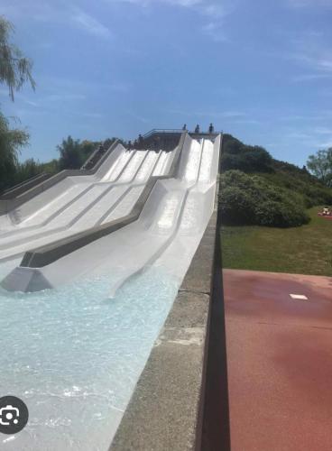 a skateboard ramp in a pool of water at Le Candle - Parking & Balcon - Muret - Toulouse in Muret