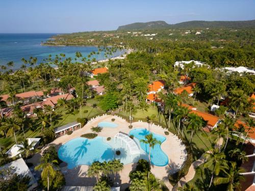 an aerial view of a resort with two swimming pools at Wyndham Alltra Samana All Inclusive Resort in Las Galeras
