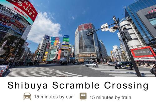 a city street with a crosswalk in a busy city at Tokyu Stay Gotanda in Tokyo
