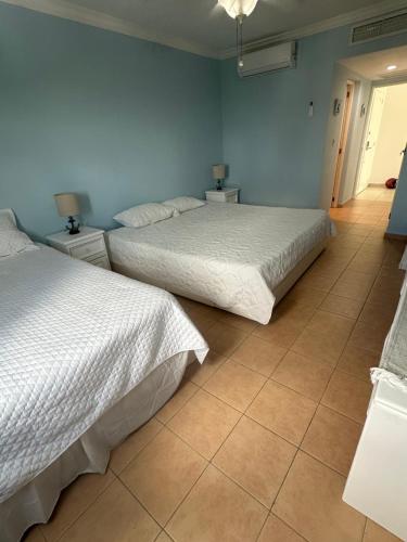 Postel nebo postele na pokoji v ubytování Paradise1