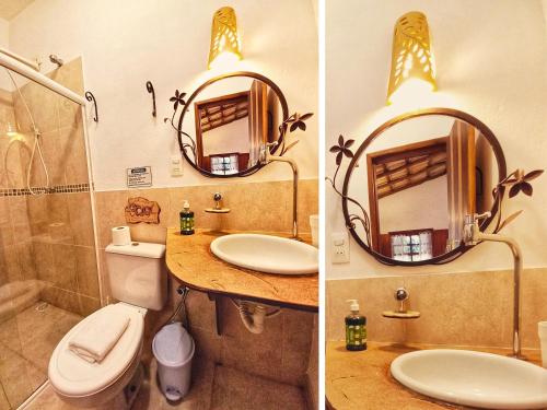 パウメイラスにあるRecanto Villa São Joãoの洗面台、トイレ、鏡のあるバスルーム