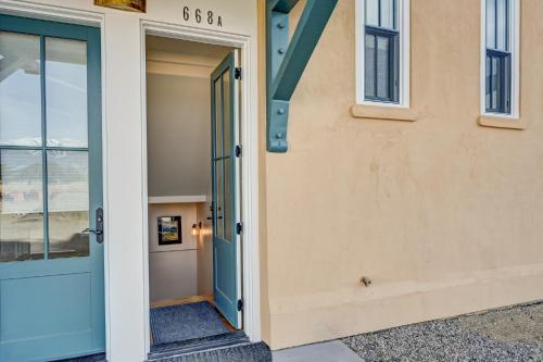 a door to a house with a sign on it at South Main Residences by Surf Hotel in Buena Vista