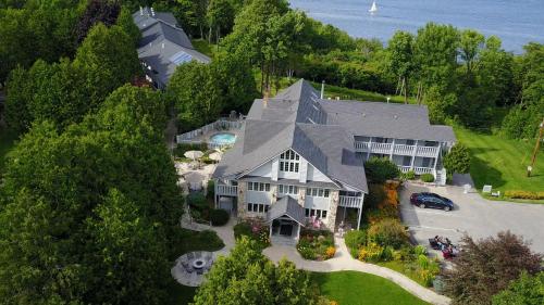 an aerial view of a large house with a driveway at Country House Resort in Sister Bay