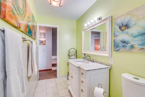 a bathroom with a sink and a mirror at Ultimate Oceanfront Townhome with AandC On Kona Coast in Kailua-Kona