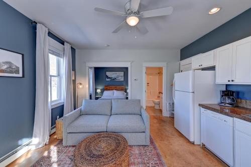 a living room with a couch and a kitchen at South Main Residences by Surf Hotel in Buena Vista