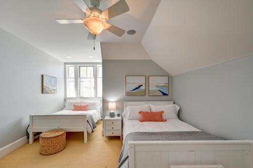 a bedroom with two beds and a ceiling fan at South Main Residences by Surf Hotel in Buena Vista
