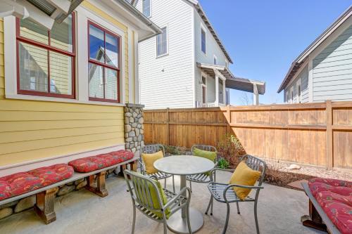 a patio with a table and chairs and a fence at South Main Residences by Surf Hotel in Buena Vista
