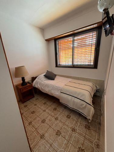 Ein Bett oder Betten in einem Zimmer der Unterkunft Casa Orejas - Departamentos en Tigre Centro