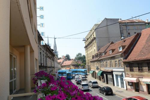 a view of a city street with cars and buildings at Hotel Jadran in Zagreb