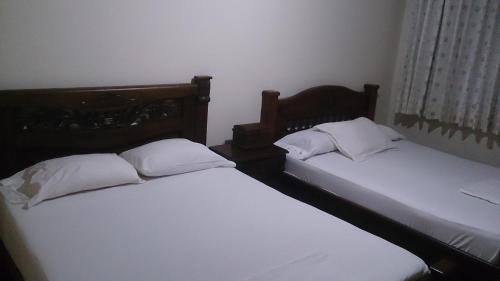 Ένα ή περισσότερα κρεβάτια σε δωμάτιο στο Apartamento Los Delfines del Caribe