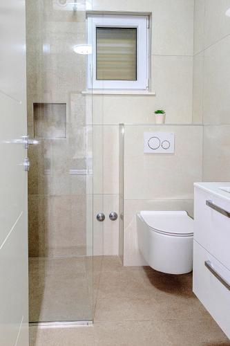 Apartments with parking space Okrug Gornji, Ciovo - 23151