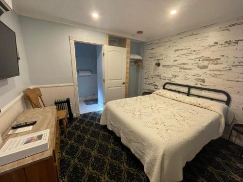 Ένα ή περισσότερα κρεβάτια σε δωμάτιο στο Sugarloaf Mountain Motel