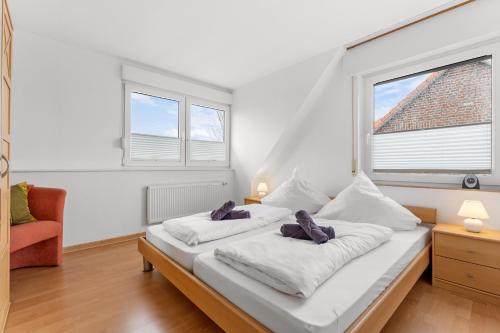 Postel nebo postele na pokoji v ubytování Carpe Tempus