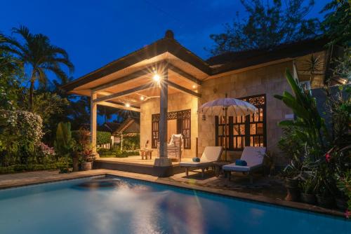 Πισίνα στο ή κοντά στο Tropical Oasis Lovina