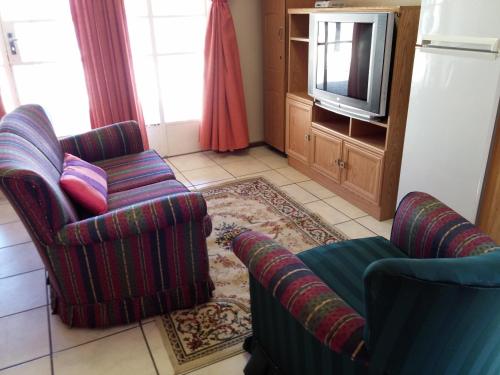 Χώρος καθιστικού στο Port Elizabeth Apartment