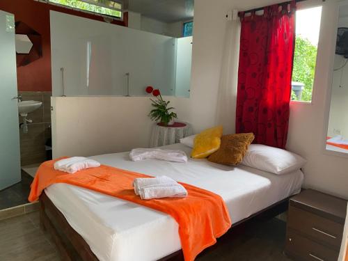 Katil atau katil-katil dalam bilik di Eco Hostal La Perla Tayrona
