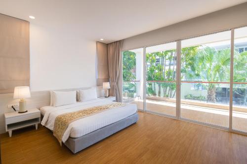 Katil atau katil-katil dalam bilik di The Residence Pelican Krabi