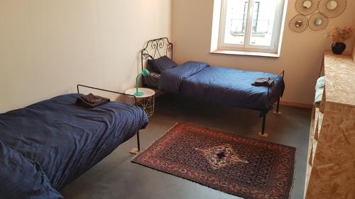 Postel nebo postele na pokoji v ubytování Vue verte