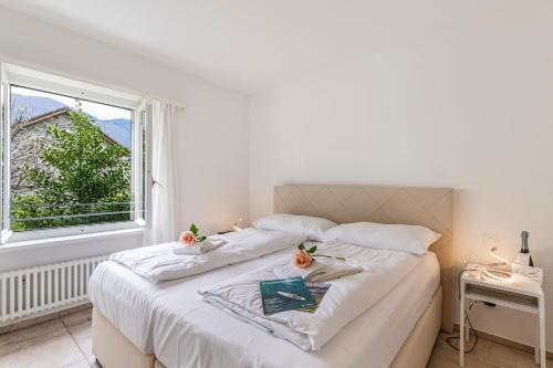 Postel nebo postele na pokoji v ubytování Residenza La Serenata