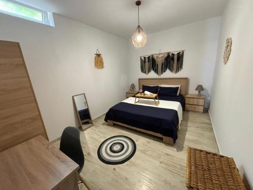 Ένα ή περισσότερα κρεβάτια σε δωμάτιο στο Kiki's House