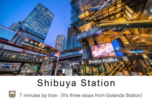 a group of tall buildings in a city at Tokyu Stay Gotanda in Tokyo