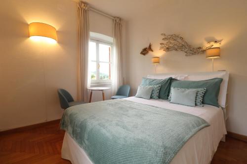 Postel nebo postele na pokoji v ubytování B&B Casa Ninni