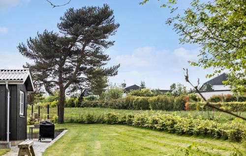a view of the garden from the house at Amazing Home In Augustenborg in Augustenborg