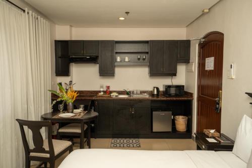 Sta Barbara Residence Hotelにあるキッチンまたは簡易キッチン