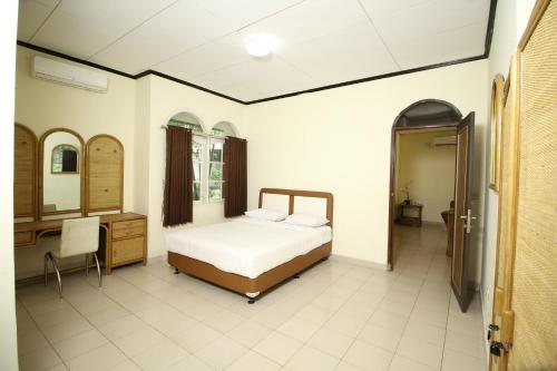 Giường trong phòng chung tại Allisa Resort Hotel