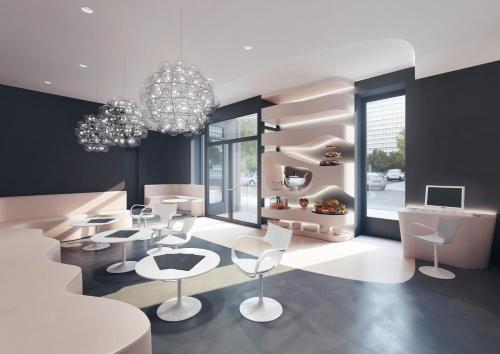 a dining room with white chairs and a chandelier at VISIONAPARTMENTS Berlin - contactless check-in in Berlin