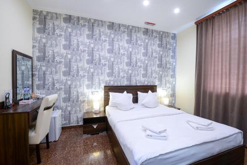 Mia Casa Hotel Yerevanにあるベッド