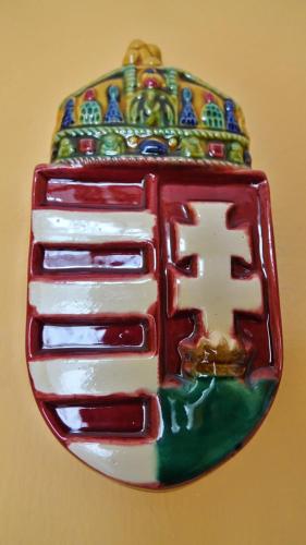 a close up of a button with at Belvárosi Erdész-lak Sopron in Sopron