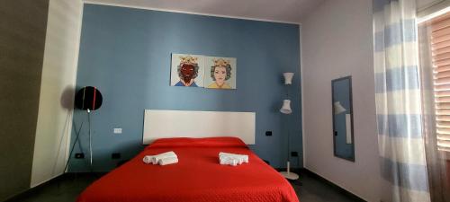 Postel nebo postele na pokoji v ubytování Casa Mandorlo a Mondello