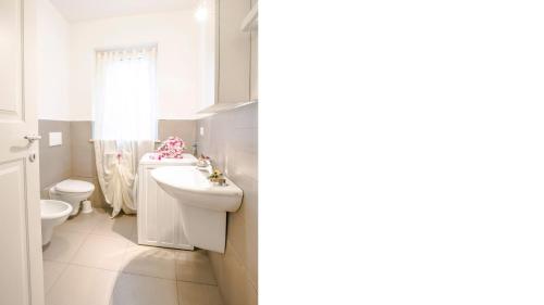 Et badeværelse på Myconos Deluxe D3 - Pineto Vacanza