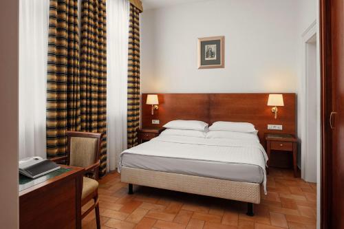 Katil atau katil-katil dalam bilik di Hotel Galileo