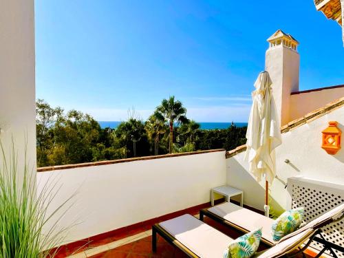 a balcony with a view of the ocean at Luxury Duplex Penthouse Sea Views in Marbella Golden Mile in Marbella